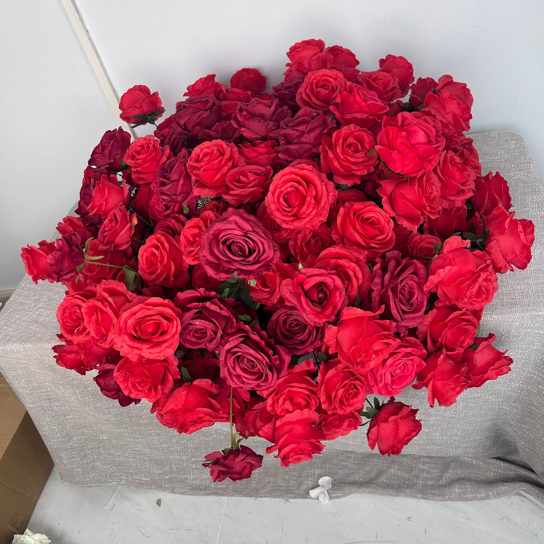 Red flower arrangement tall centerpiece